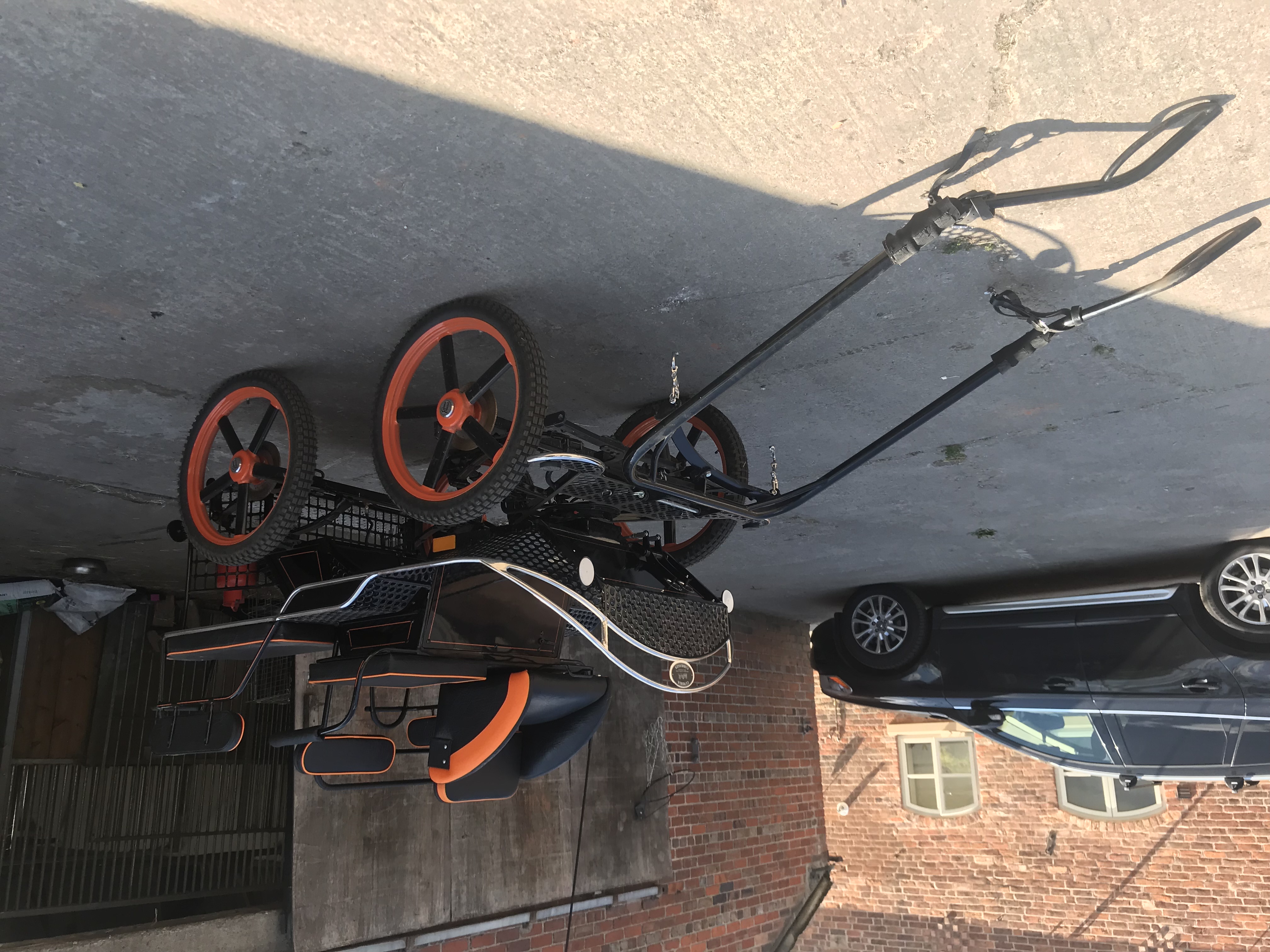 Black and orange competition vehicle