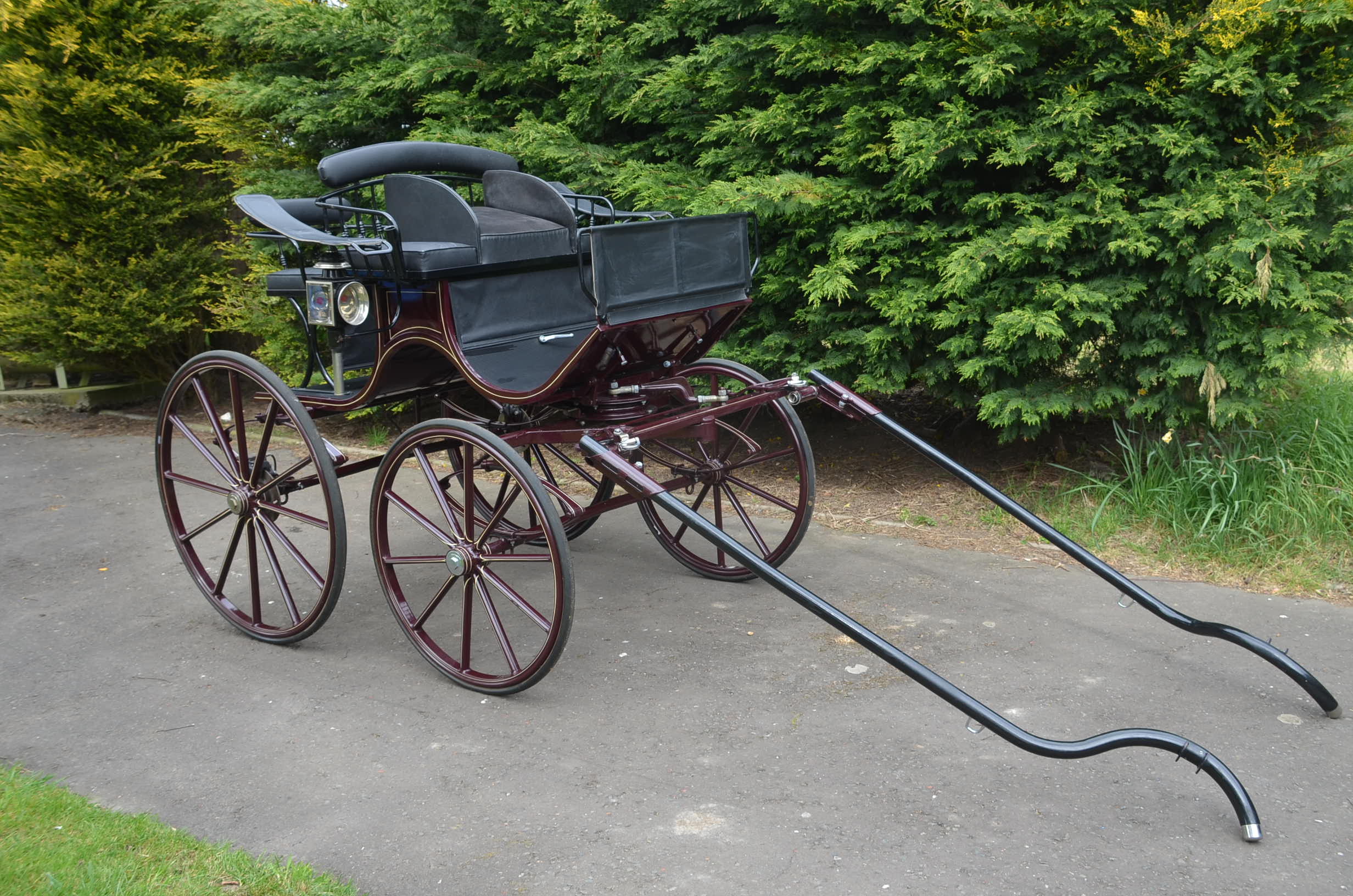 Maroon Presentation Vehicle